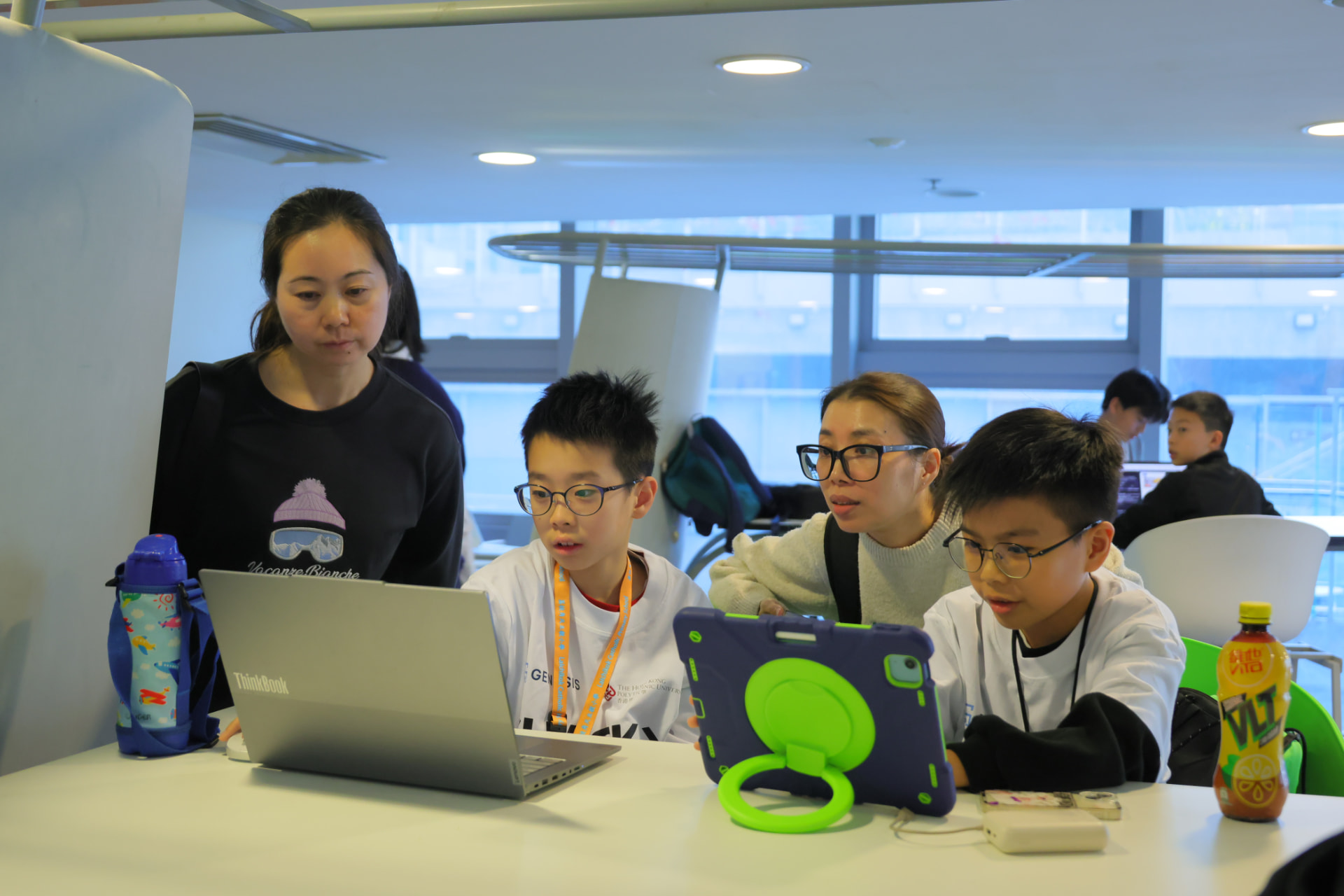 Young participants working with a mentor